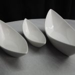 three white gondola bowls