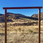 close up of wooden wedding arch