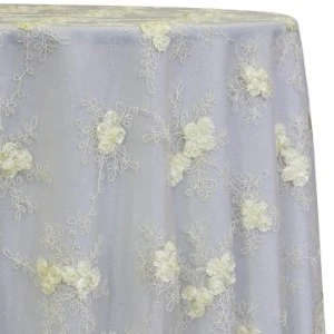 Pale lavender sheer lace tablecloth with delicate ivory floral embroidered clusters.