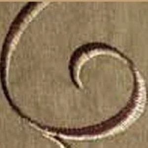 Curved spiral sepia-toned decorative architectural element with smooth spiral design.