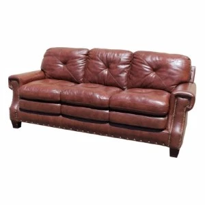 Burgundy leather sofa with tufted back cushions and rolled arms for event seating rental.