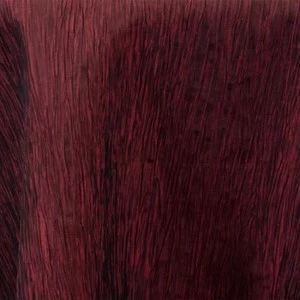 Deep burgundy wood grain texture with rich, dark red vertical lines and varied shading.
