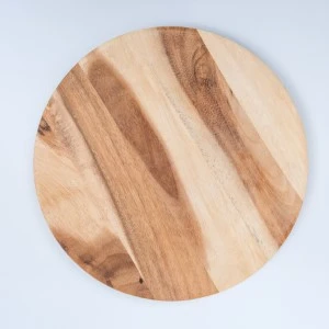 Circular wooden cutting board with natural wood grain in warm beige and brown tones.