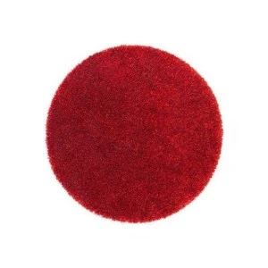 Fluffy red round area rug with soft shaggy texture for event floor decor.