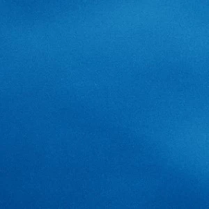 Solid blue fabric backdrop with smooth, uniform texture for event photography or decor.