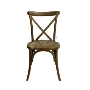 Rustic wooden cross-back chair with curved frame and woven seat for event rentals.