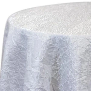 White crushed shimmer fabric tablecloth with crinkled texture for elegant event rentals.