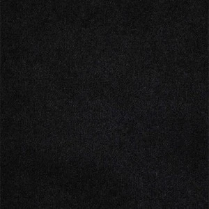 Solid black background, appears to be a plain dark surface or textile material.