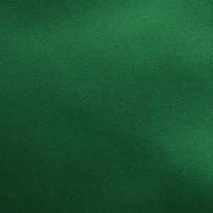 Deep emerald green solid fabric with soft textured surface for event rentals.