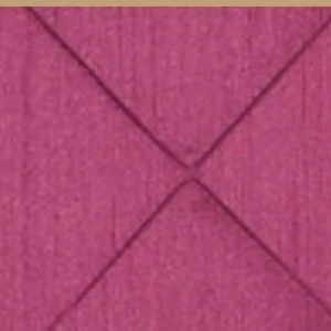 Dusty rose textured fabric with intersecting diagonal lines forming an X pattern.