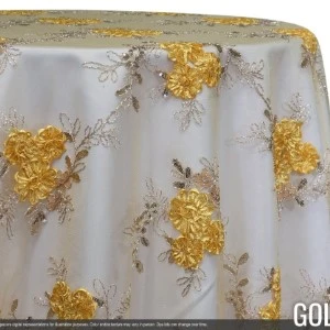 Gold and white floral lace tablecloth with metallic embroidered roses on sheer fabric.
