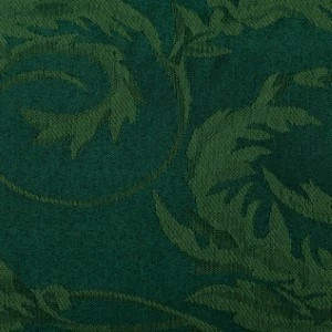 Dark emerald green damask fabric with textured leaf and vine pattern for elegant event linen rental.