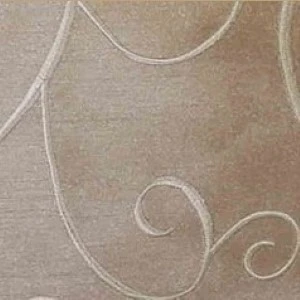 Neutral beige fabric with delicate curved line embroidery creating soft, elegant design.