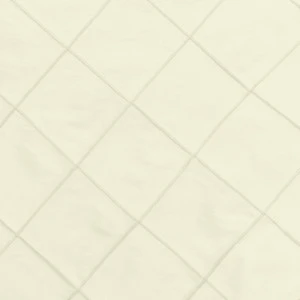 Cream-colored fabric with subtle diamond grid texture for elegant event linen rental.
