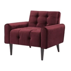 Burgundy velvet armchair with tufted back and seat on tapered dark wood legs.