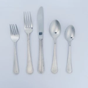 Silver stainless steel flatware set with five elegant utensils in classic design.