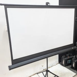 Portable white projection screen on black tripod stand for presentations and events.