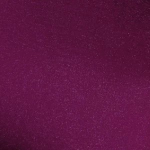Deep purple fabric with soft textured surface and subtle shimmer for elegant event rentals.