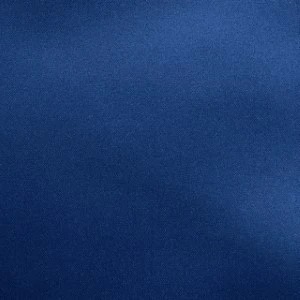 Solid navy blue fabric with smooth, uniform texture and matte finish for event linens.