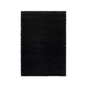 Black shag area rug with plush, dense texture and soft, fuzzy surface for home decor.