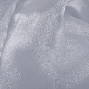 Shimmery silver fabric with soft folds and subtle metallic textured surface for elegant event decor.