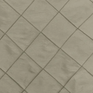 Taupe pintuck fabric with diagonal diamond pleated texture for event linen rentals.