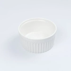 White ceramic ramekin with ribbed exterior, round baking dish for event catering and tableware rentals.
