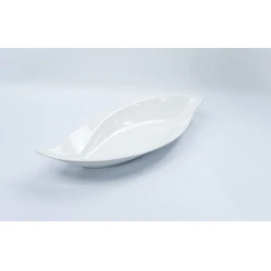 Oval white ceramic serving dish with smooth glossy surface and elongated boat-shaped design.