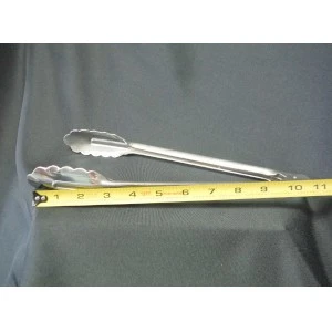 Stainless steel kitchen tongs with serrated edges, measured against yellow tape measure on gray background.