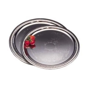 Two round silver serving trays with beaded edge, nestled together with two red berries.