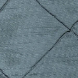 Steel blue pintuck textured linen with geometric diamond-shaped pleated fabric pattern.