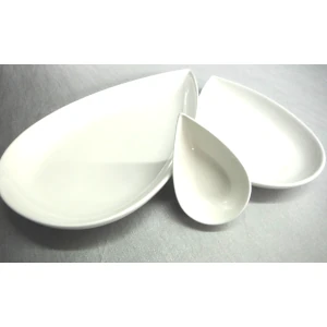 Three petal shaped white plates in small, medium, and large
