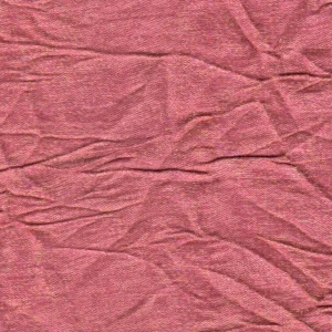 Rose wrinkled fabric with soft textured surface and delicate creased appearance.