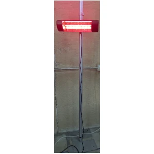 A small space heater mounted on a pole coming up from the floor